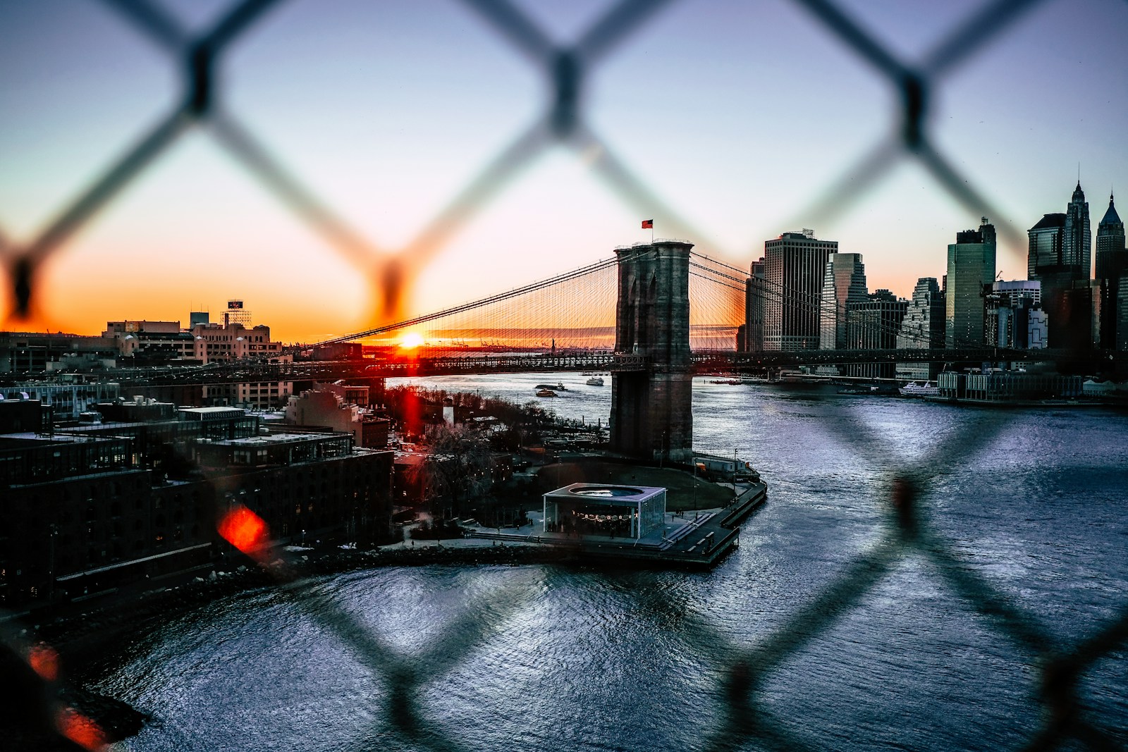 Photo by Matteo Catanese city buildings under sunset